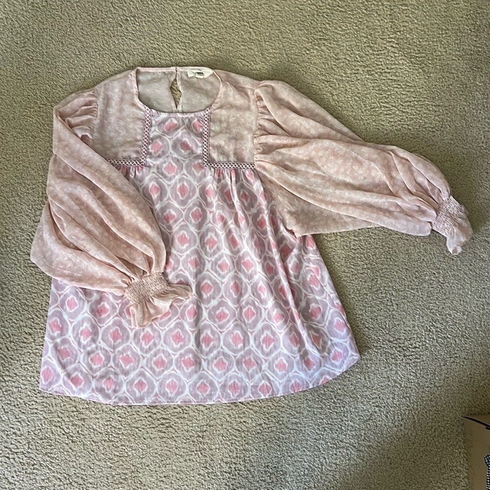 Gently-used, seasonal transitional top with flowy sleeves.